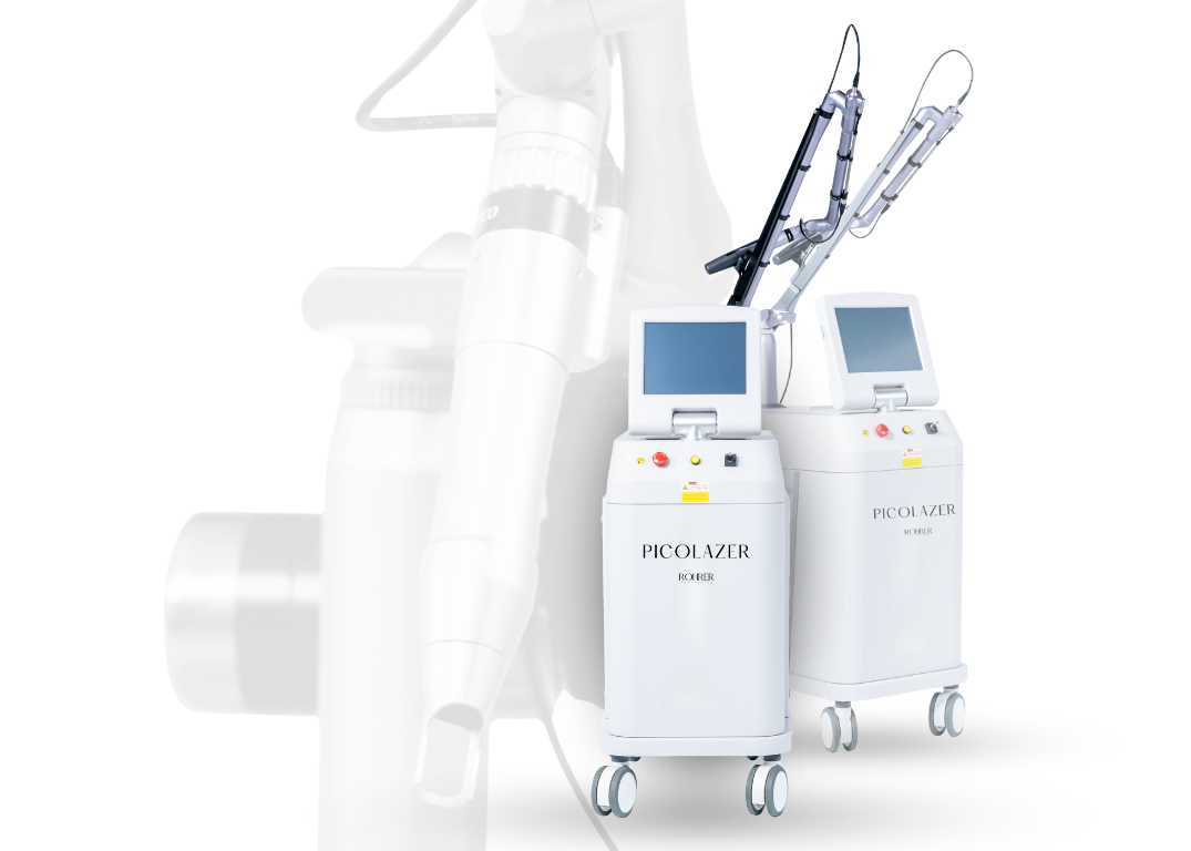 Two Rohrer Aesthetics PicoLazer devices with touchscreen displays and articulated laser arms, designed for skin treatments.